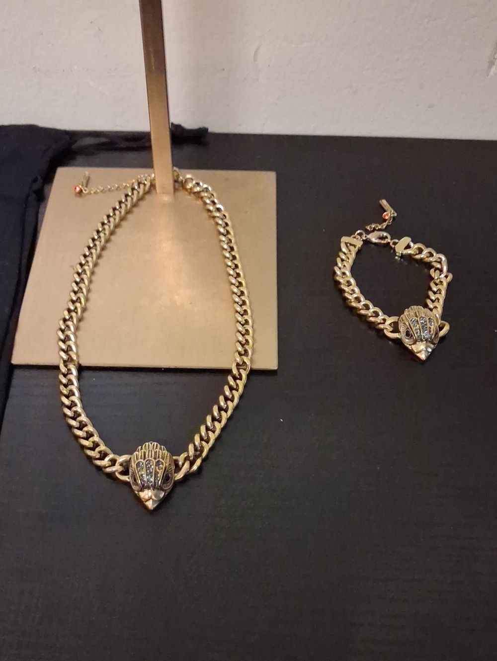 Kurt Geiger Gold-Tone Chain Necklace and Bracelet Set with Sculpted Pendant - Picture 12 of 12